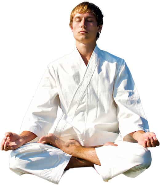 Martial Arts Lessons for Adults in Seattle WA - Young Man Thinking and Meditating in White